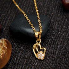 22K Gold-Plated Heart Pendant with a Flower Design and AD Diamond Studs.